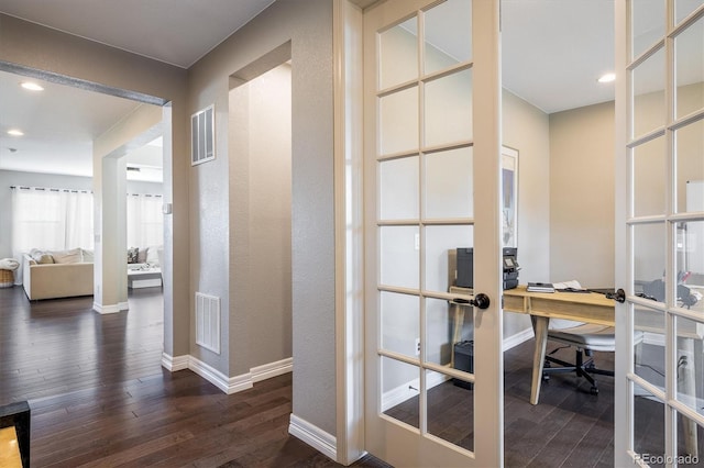 14807 Haley Ave, Parker, CO 80134 - home office with dark wood-style flooring, baseboards, french doors, and visible vents