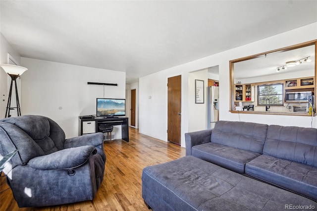 living room featuring hardwood / wood-style flooring