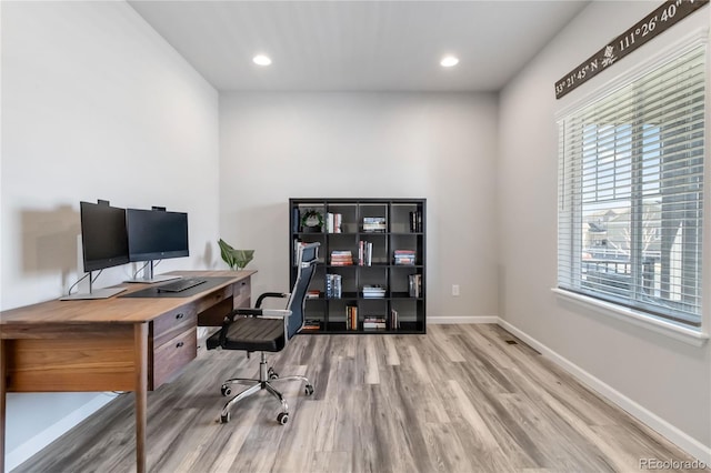 home office with recessed lighting, baseboards, and wood finished floors