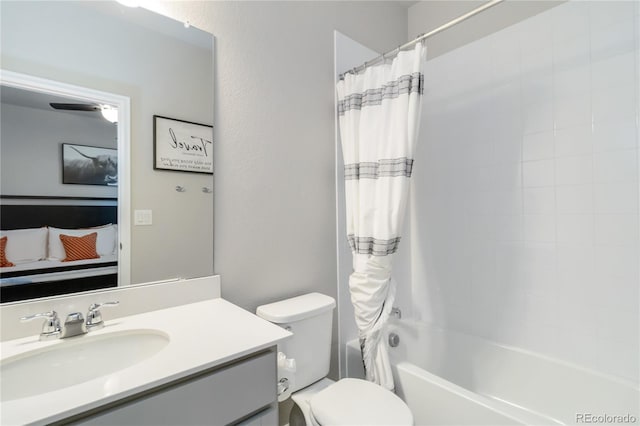 ensuite bathroom with shower / tub combo with curtain, toilet, ensuite bath, and vanity