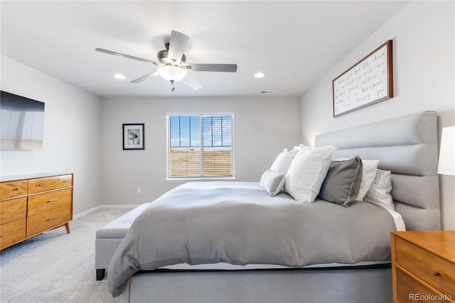 bedroom featuring a ceiling fan, visible vents, baseboards, recessed lighting, and light colored carpet