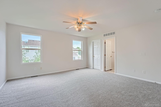 5522 S Quemoy Cir, Aurora, CO 80015 - empty room with light carpet and ceiling fan