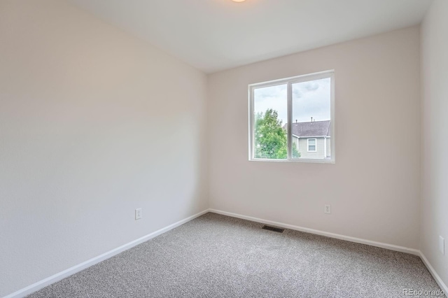5522 S Quemoy Cir, Aurora, CO 80015 - spare room with carpet floors