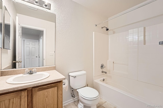 5522 S Quemoy Cir, Aurora, CO 80015 - bathroom featuring vanity, shower / tub combination, and a textured wall