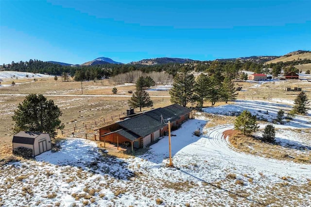 property view of mountains featuring a rural view