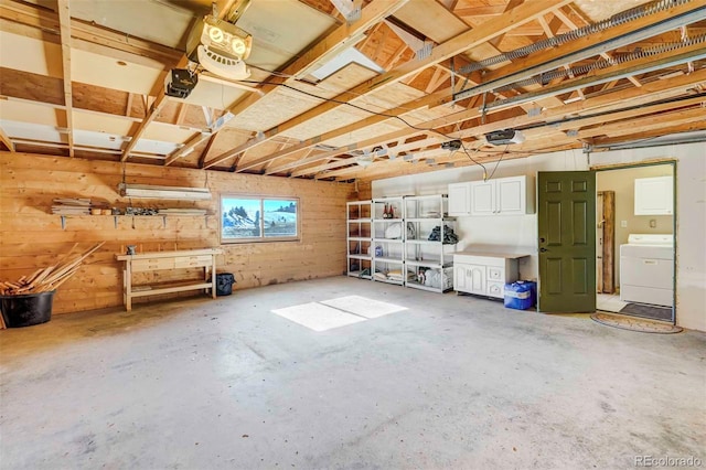 interior space with washer / clothes dryer and a workshop area