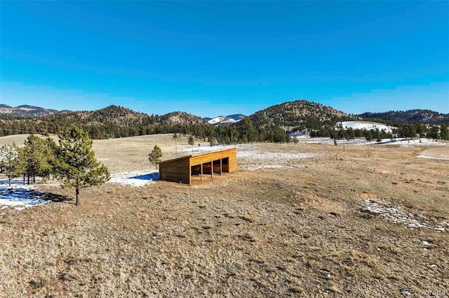 property view of mountains with a rural view