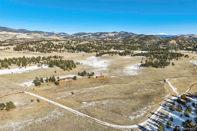 bird's eye view featuring a mountain view and a rural view