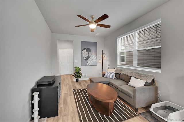 847 Great Plains Ave, Berthoud, CO 80513 - living room featuring a ceiling fan and light wood-style flooring