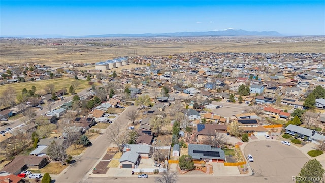 2115 Rangeview Dr, Pueblo, CO 81008 - aerial view of property's location featuring a mountainous background and nearby suburban area