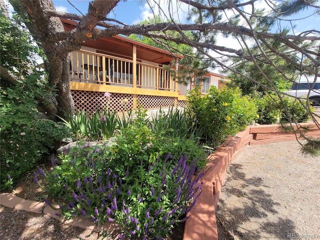 2115 Rangeview Dr, Pueblo, CO 81008 - view of yard with a wooden deck