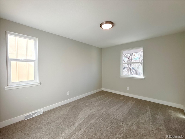 view of carpeted spare room