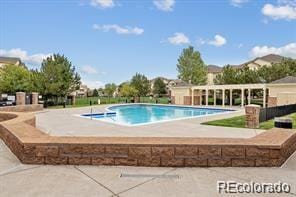 5726 N Genoa Way Unit 301, Aurora, CO 80019 - swimming pool with a patio