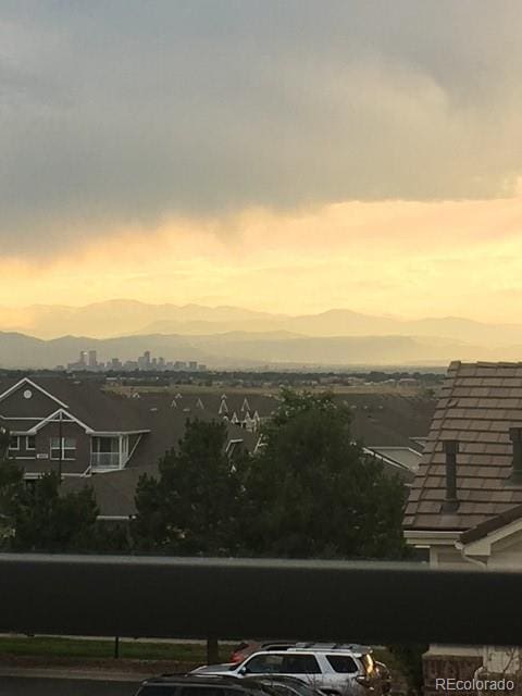 5726 N Genoa Way Unit 301, Aurora, CO 80019 - water view featuring mountains