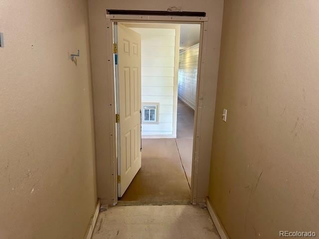 5726 N Genoa Way Unit 301, Aurora, CO 80019 - corridor featuring baseboards