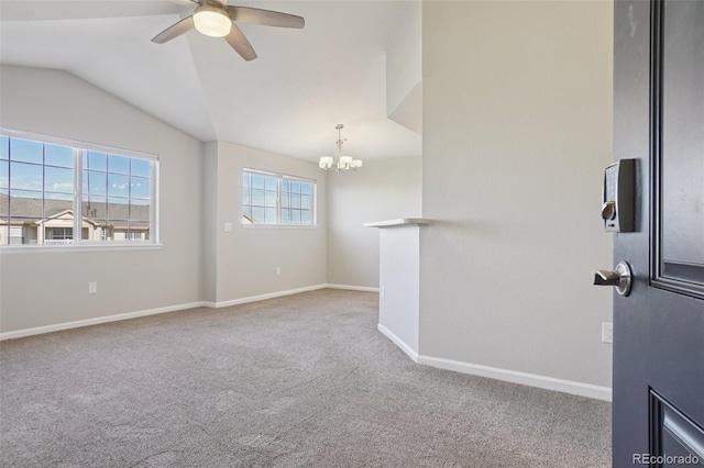 5726 N Genoa Way Unit 301, Aurora, CO 80019 - carpeted empty room featuring a chandelier, a ceiling fan, and lofted ceiling