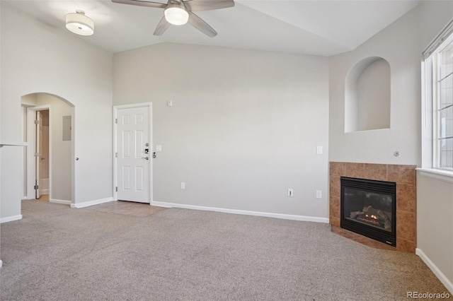 5726 N Genoa Way Unit 301, Aurora, CO 80019 - unfurnished living room with carpet flooring, lofted ceiling, plenty of natural light, and ceiling fan