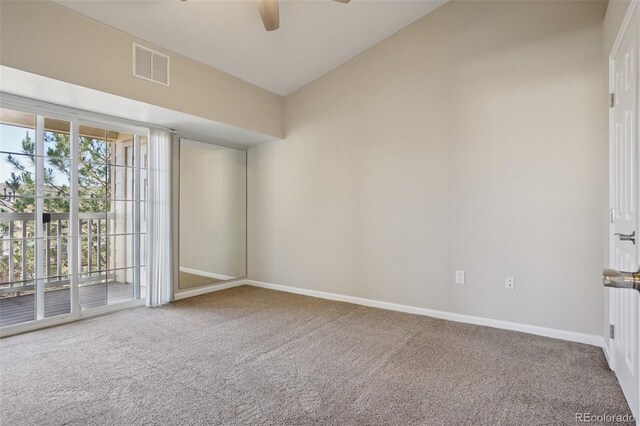 5726 N Genoa Way Unit 301, Aurora, CO 80019 - spare room featuring carpet flooring, ceiling fan, and vaulted ceiling
