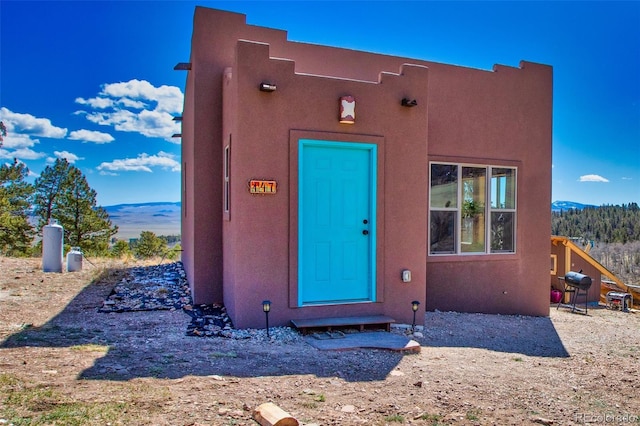 exterior space featuring a mountain view