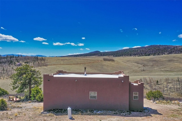 property view of mountains with a rural view