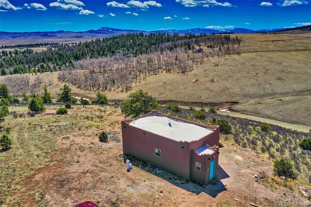 bird's eye view with a mountain view