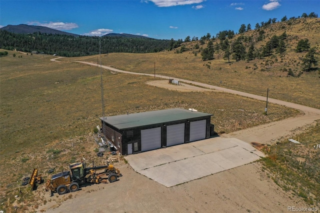 exterior space featuring a mountain view