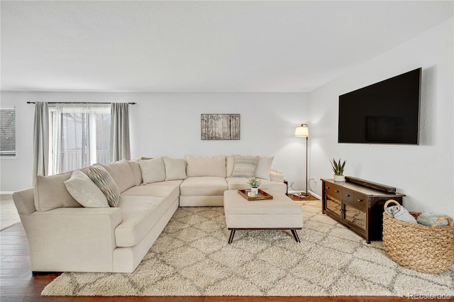 living room with wood finished floors