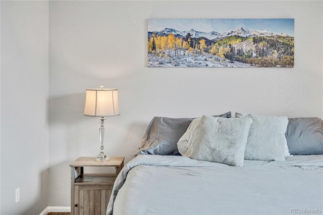 bedroom featuring baseboards