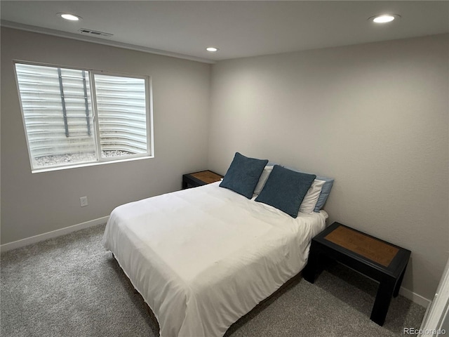 bedroom with baseboards, visible vents, and recessed lighting