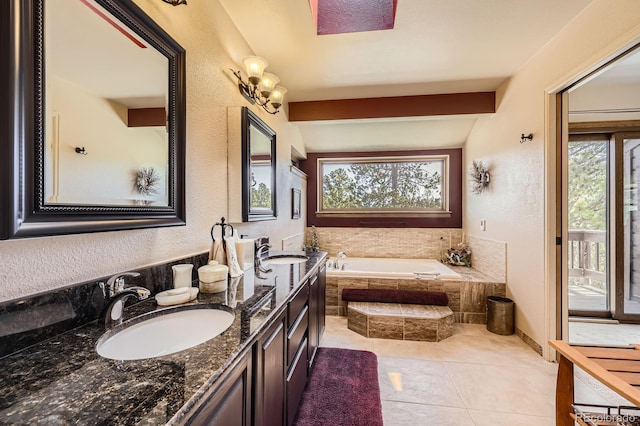 full bathroom with plenty of natural light, a bath, and a sink