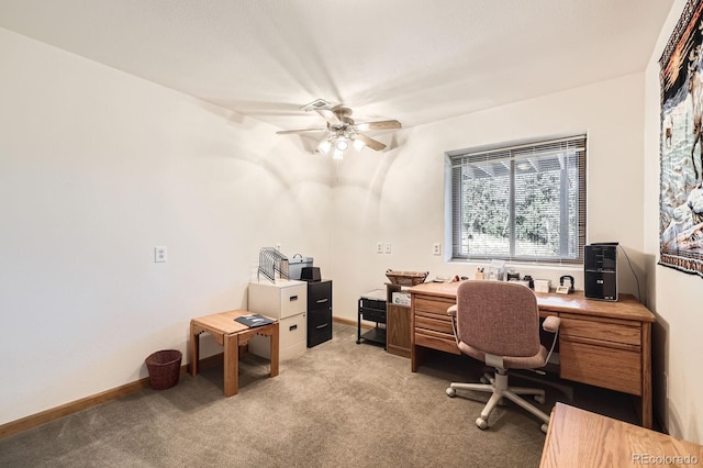 office with ceiling fan, light colored carpet, and baseboards
