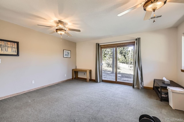 carpeted empty room with ceiling fan, baseboards, and visible vents
