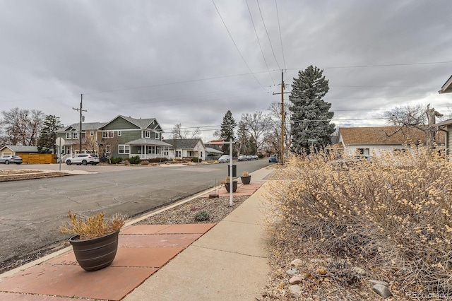 109 W Simpson St, Lafayette, CO 80026 - view of asphalt street featuring sidewalks and a residential view