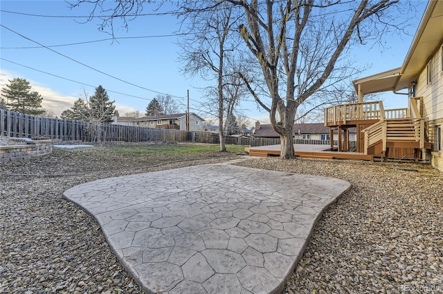 view of yard with a patio area and a deck