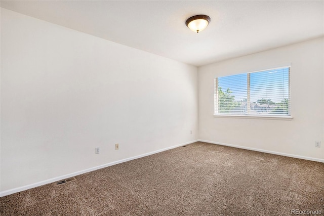 unfurnished room with carpet