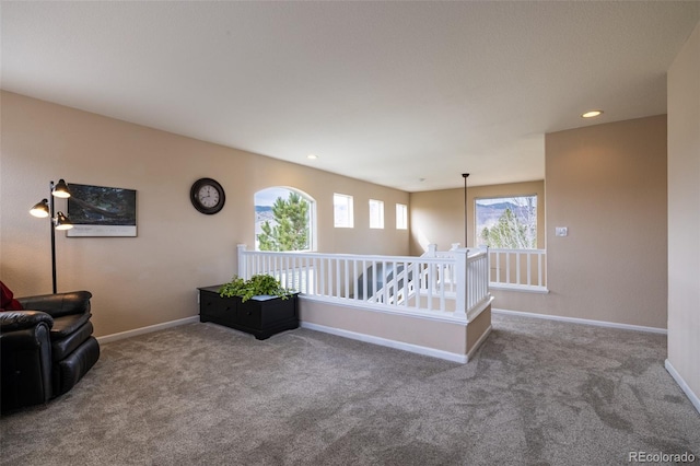 7661 Chickaree Ct, Littleton, CO 80125 - sitting room featuring an upstairs landing, carpet flooring, baseboards, and recessed lighting