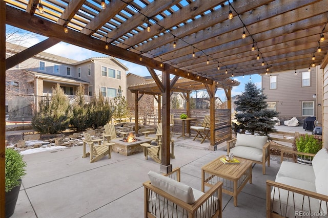 view of patio / terrace featuring an outdoor living space with a fire pit and a pergola