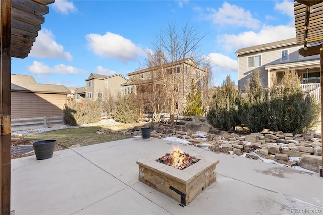 view of patio featuring a fire pit