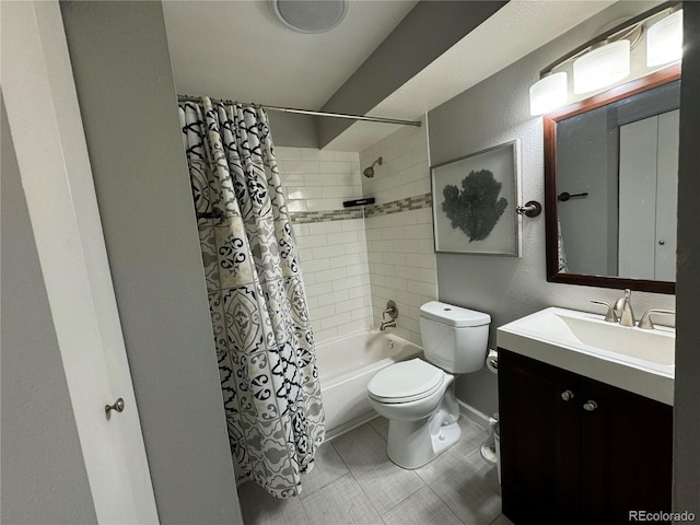 full bathroom with tile patterned flooring, shower / bath combination with curtain, toilet, and vanity