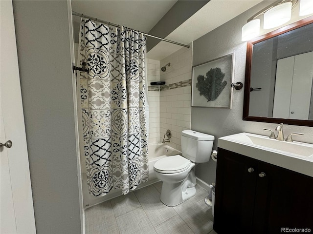 full bathroom featuring tile patterned floors, vanity, toilet, and shower / tub combo with curtain