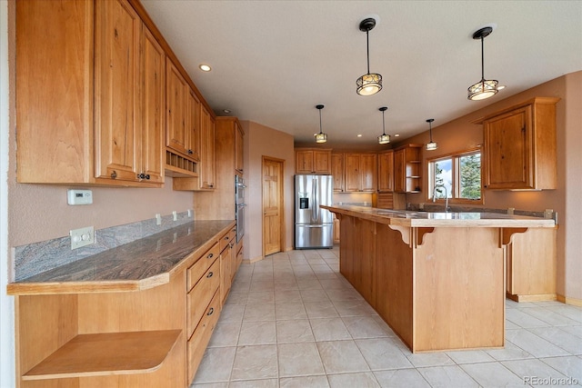23007 Big Game Trl, Conifer, CO 80433 - kitchen featuring appliances with stainless steel finishes, open shelves, a breakfast bar area, decorative light fixtures, and light tile patterned flooring