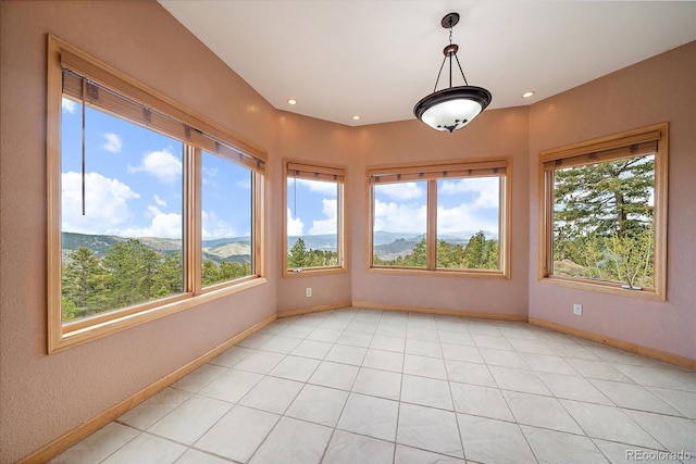 23007 Big Game Trl, Conifer, CO 80433 - unfurnished sunroom featuring baseboards and recessed lighting