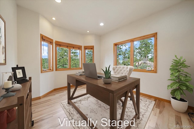 23007 Big Game Trl, Conifer, CO 80433 - office space with healthy amount of natural light, recessed lighting, light wood finished floors, and baseboards
