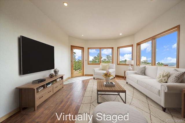 23007 Big Game Trl, Conifer, CO 80433 - living area featuring light wood-style floors, baseboards, and recessed lighting