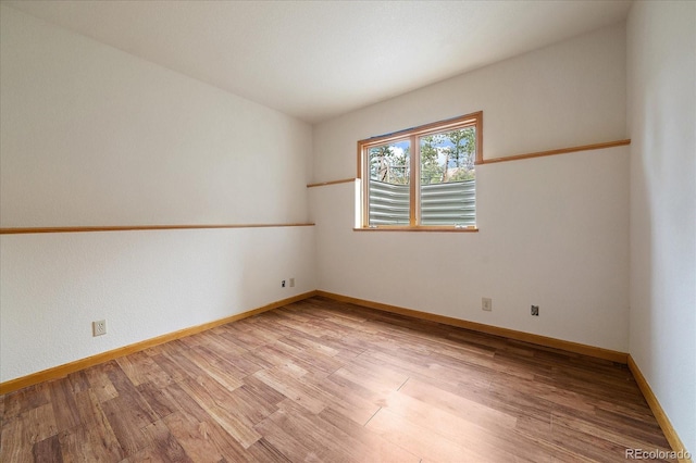 23007 Big Game Trl, Conifer, CO 80433 - unfurnished room with light wood finished floors and baseboards