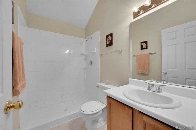 6737 Overland Dr, Colorado Springs, CO 80919 - bathroom featuring toilet, tiled shower, and vanity