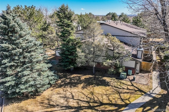 15157 E Louisiana Dr Unit A, Aurora, CO 80012 - view of property exterior featuring solar panels