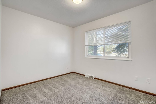 15157 E Louisiana Dr Unit A, Aurora, CO 80012 - unfurnished room featuring carpet flooring and baseboards