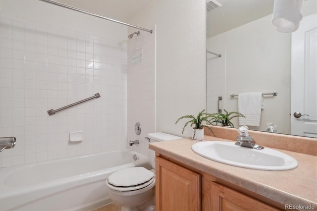 full bath with toilet, visible vents, shower / washtub combination, and vanity