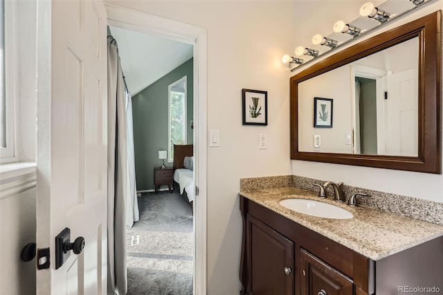 7792 Garrison Ct, Arvada, CO 80005 - bathroom with vanity and connected bathroom